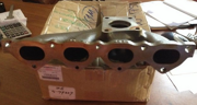 OEM EXHAUST MANIFOLD ASSY 1555A223